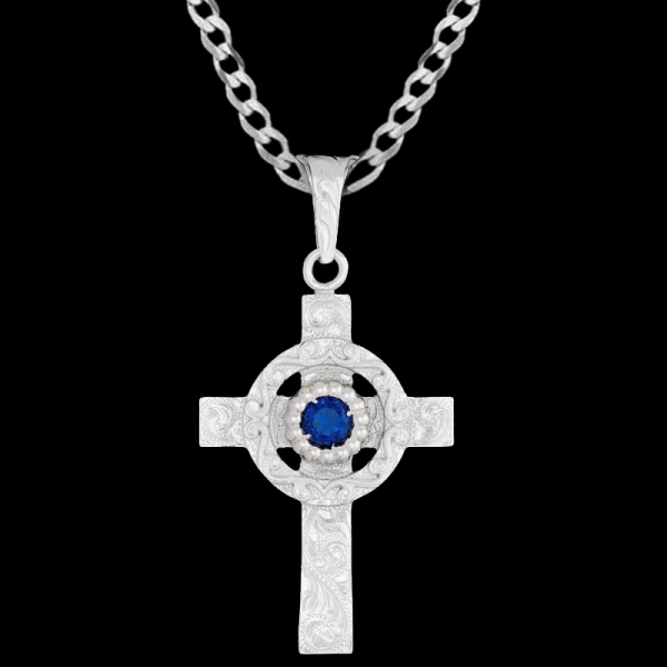 Reveal our Song of Solomon Cross Pendant Necklace: a stunning german silver cross in shiny finish with hand engraved scrollwork and a large customizable zirconia stone. Pair it with a special discount sterling silver chain today!